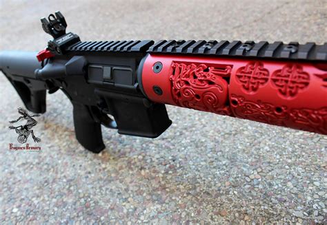 Unleash your inner warrior with a handguard featuring the mighty Odin's rune